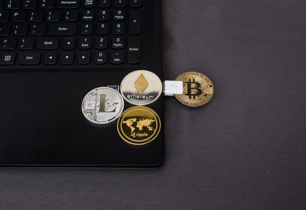 coins on laptop