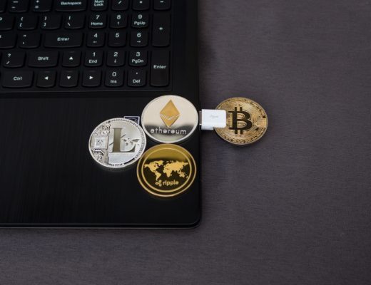 coins on laptop